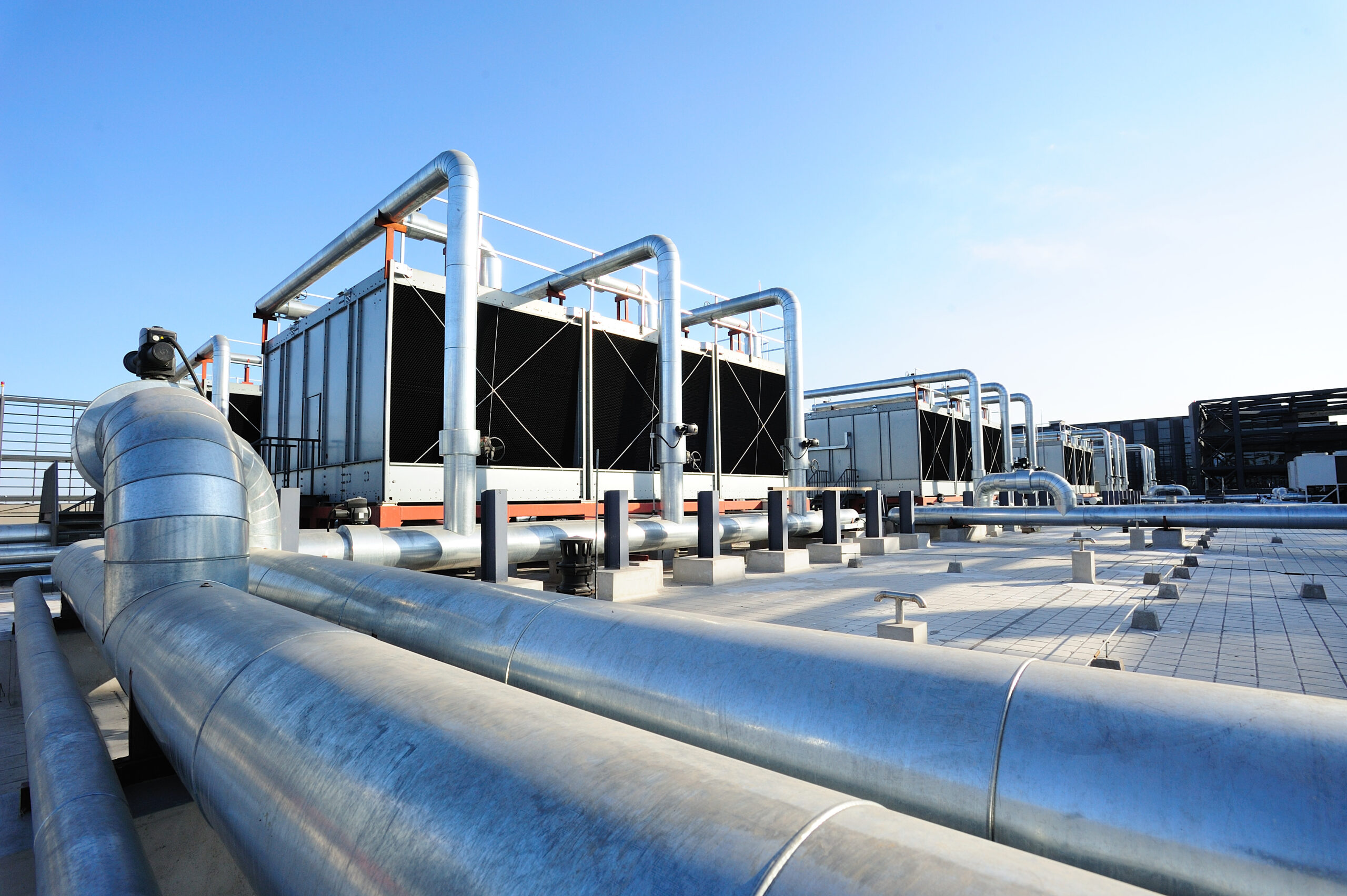 Sets of cooling towers in data center building.